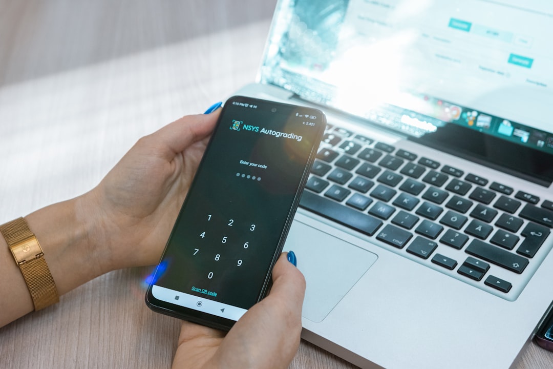 Phone showing two-factor authentication code — Bitwarden master account 2FA setup with TOTP and FIDO2 hardware keys
